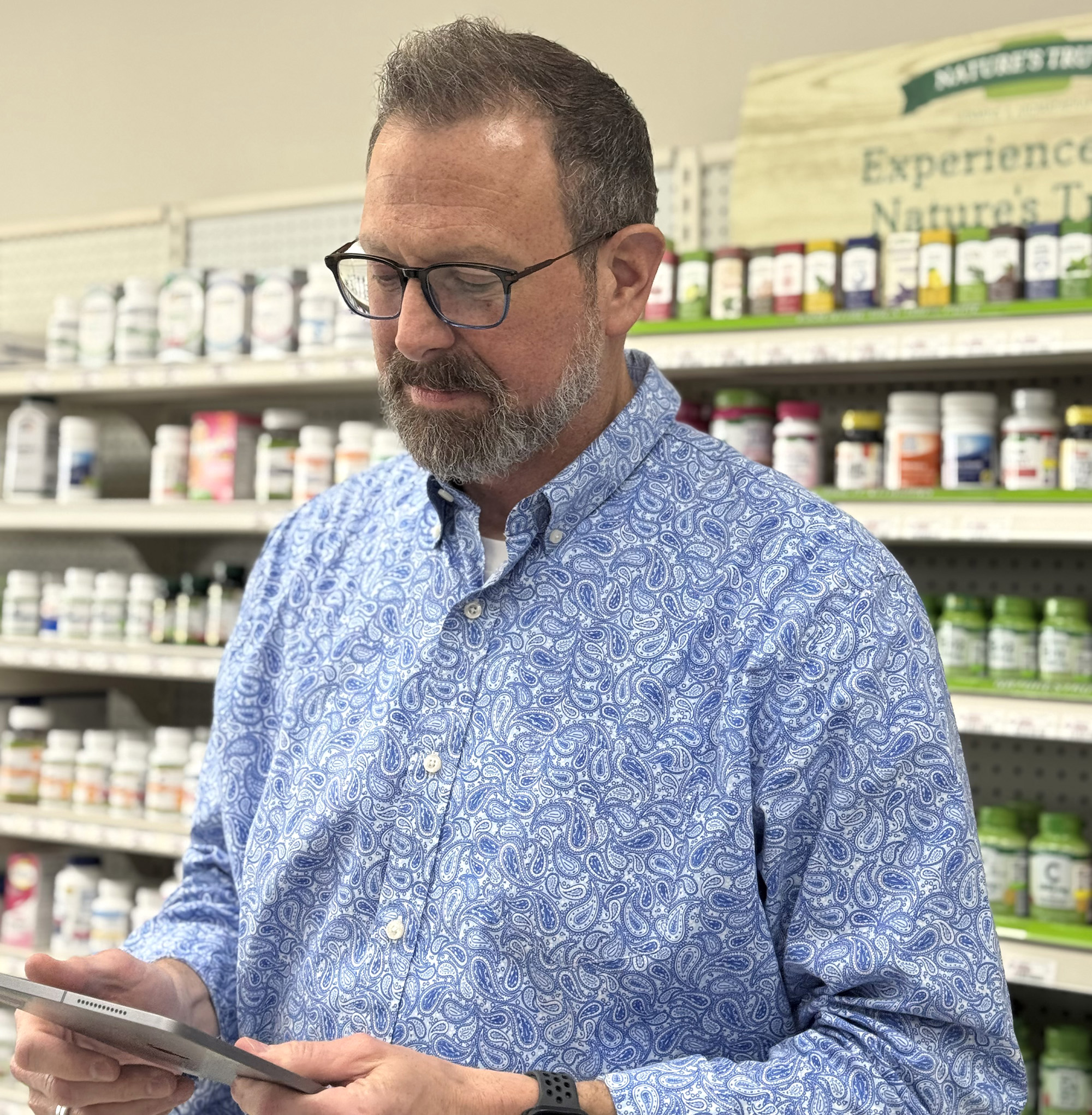 man in tablet at home